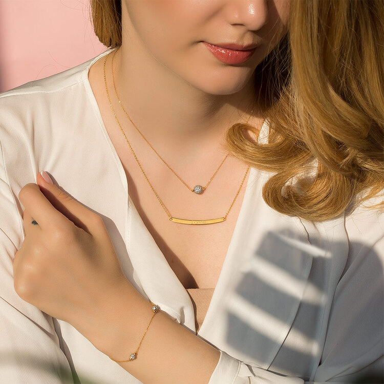دستبند طلا زنانه با سه گوی سواروسکی کد ACB390