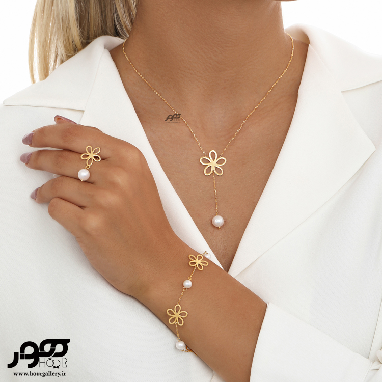 دستبند طلا  زنانه طرح گل و مروارید کد AXB844